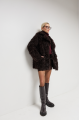 Curly double-sided chocolate-colored sheepskin coat made of natural sheepskin